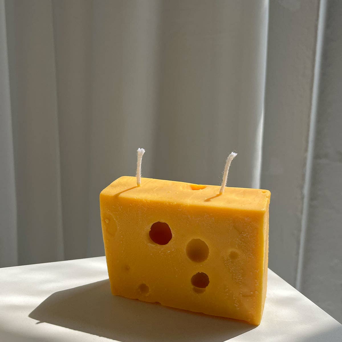 Holey Cheese Candle